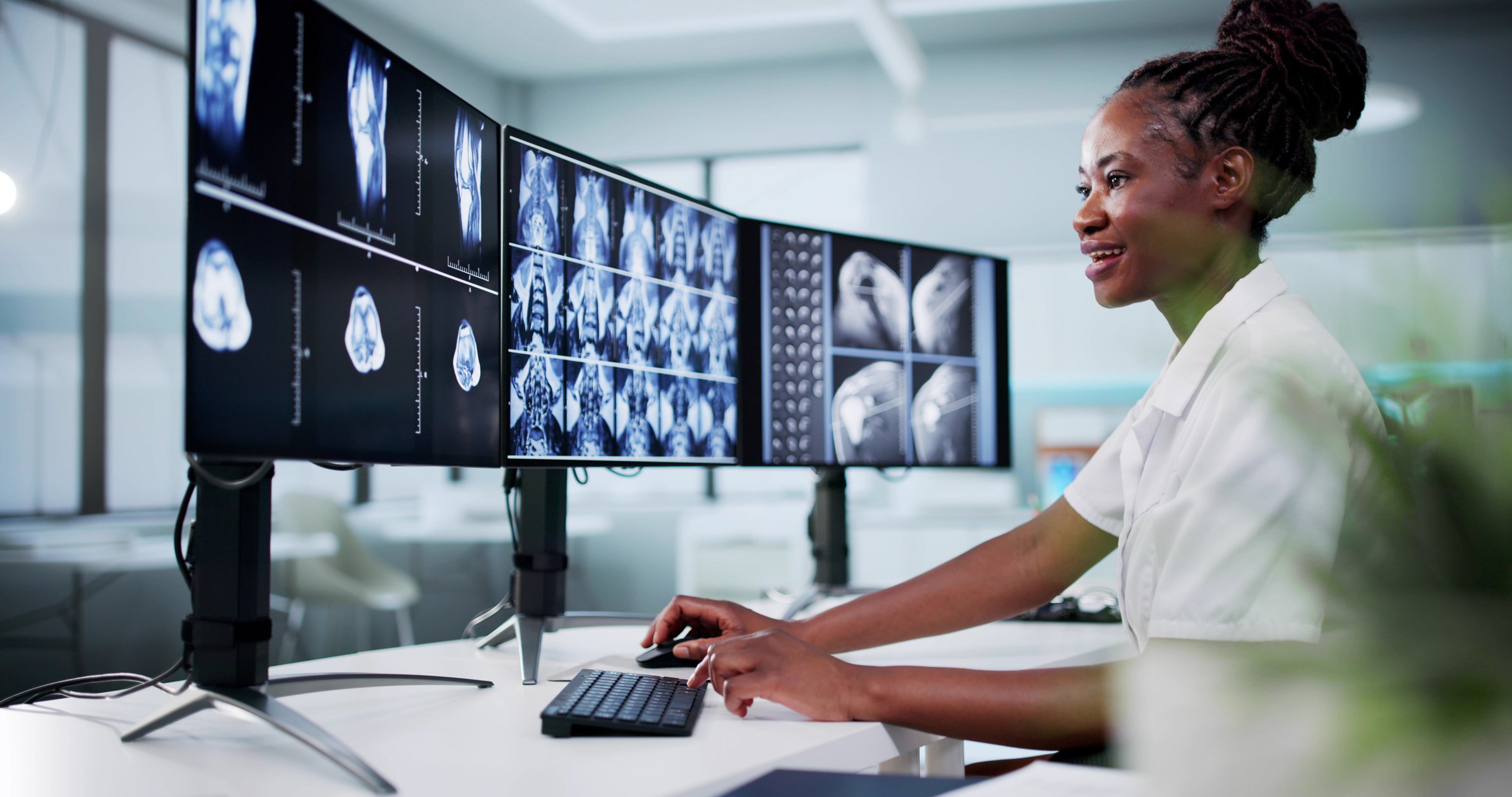 Radiologist screening shoulder and x-ray studies